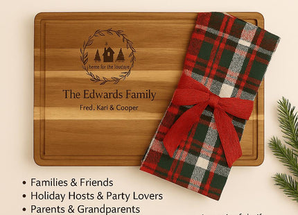 Personalized acacia cutting board engraved with a holiday home design and “The Edwards Family” is displayed with a plaid towel tied in a red bow, alongside a list of gifting ideas for families, friends, hosts, parents, grandparents, newlyweds, and loved ones, with holiday greenery accents.