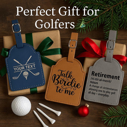 "Three personalized leather golf bag tags displayed on wrapped holiday gifts with green and red ribbons, surrounded by golf tees, a golf ball, and evergreen branches. The navy tag shows crossed golf clubs with customizable text, the tan tag reads 'Talk Birdie to me,' and the gray tag defines 'Retirement' humorously as 'A change of circumstances allowing one to play golf all day — everyday.' Text at the top reads 'Perfect Gift for Golfers' with a small Christm