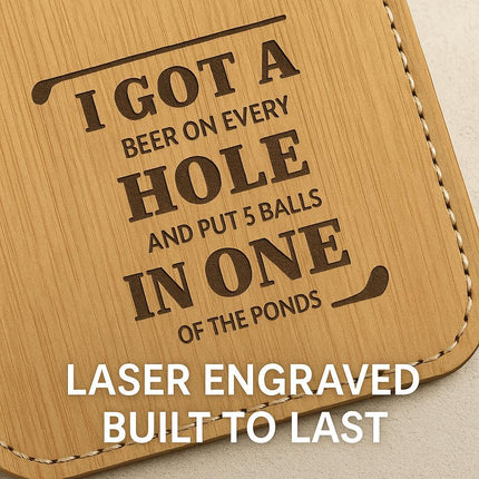 "Close-up of a tan bamboo leather golf tag with engraved text that reads 'I got a beer on every hole and put 5 balls in one of the ponds,' framed by golf club icons. White text overlay at the bottom reads 'Laser Engraved Built to Last,' highlighting the durability and precision of the engraving."