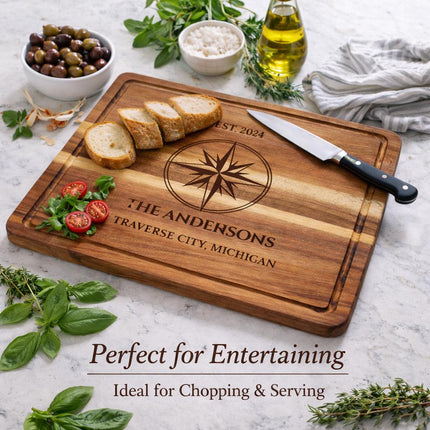 Personalized nautical compass cutting board displayed on kitchen counter showing real home use and coastal decor style