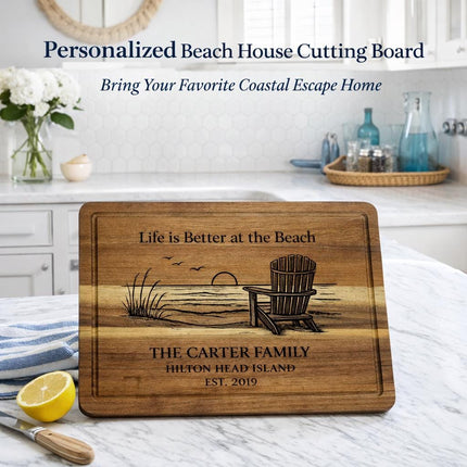 Personalized beach house cutting board displayed in bright coastal kitchen with nautical decor and marble countertop