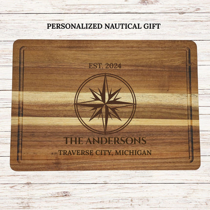 Personalized acacia wood cutting board with engraved compass design family name and location custom nautical gift