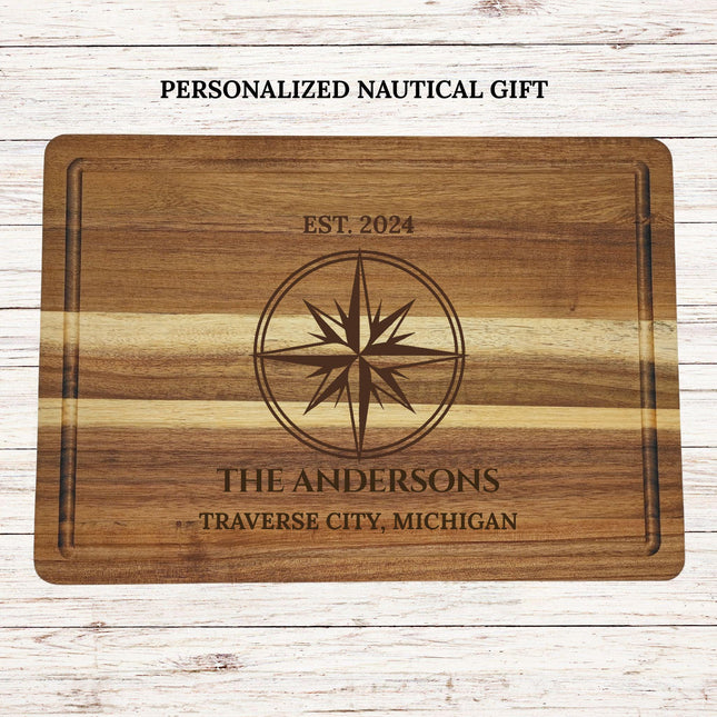 Personalized acacia wood cutting board with engraved compass design family name and location custom nautical gift