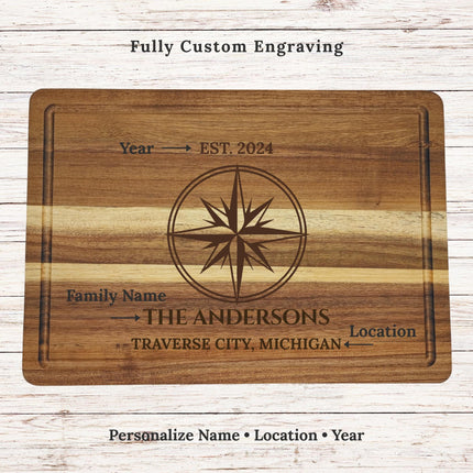 Custom engraved cutting board showing personalization options for family name location and established year nautical compass design