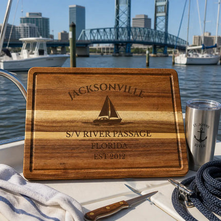 Jacksonville Florida sailboat cutting board on a boat cockpit table with St Johns River marina background and working harbor setting
