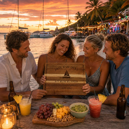 Jost Van Dyke British Virgin Islands personalized cutting board being shared during a tropical Caribbean sailing gathering beside beach bars catamarans and turquoise water