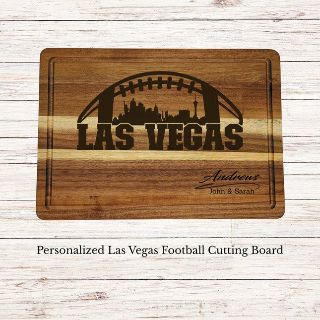 Personalized Las Vegas football cutting board engraved on acacia wood with skyline football design and custom family name