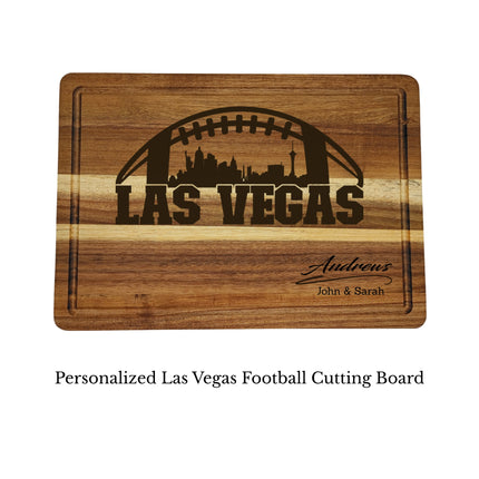 Close up engraving detail of personalized Las Vegas football cutting board showing skyline football design on acacia wood