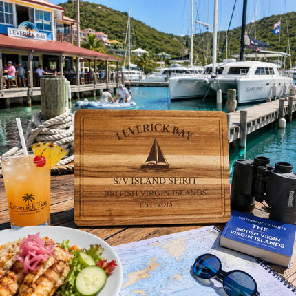 Leverick Bay British Virgin Islands sailboat cutting board displayed beside marina docks catamarans turquoise North Sound waters and tropical Virgin Gorda waterfront scenery
