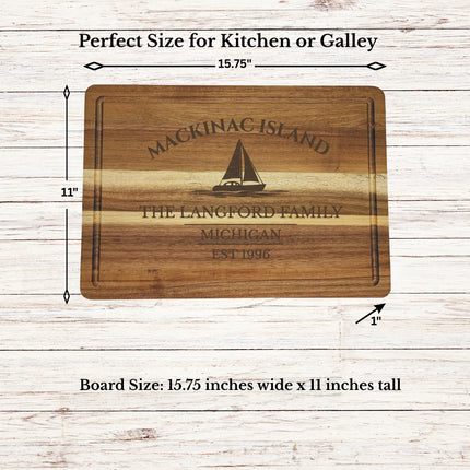 Mackinac Island Michigan sailboat cutting board displayed on kitchen counter showing size scale and serving presentation