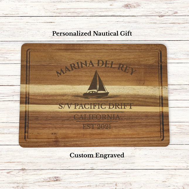 Personalized Marina del Rey nautical cutting board engraved with sailboat design, custom boat name Pacific Drift, California coastal gift