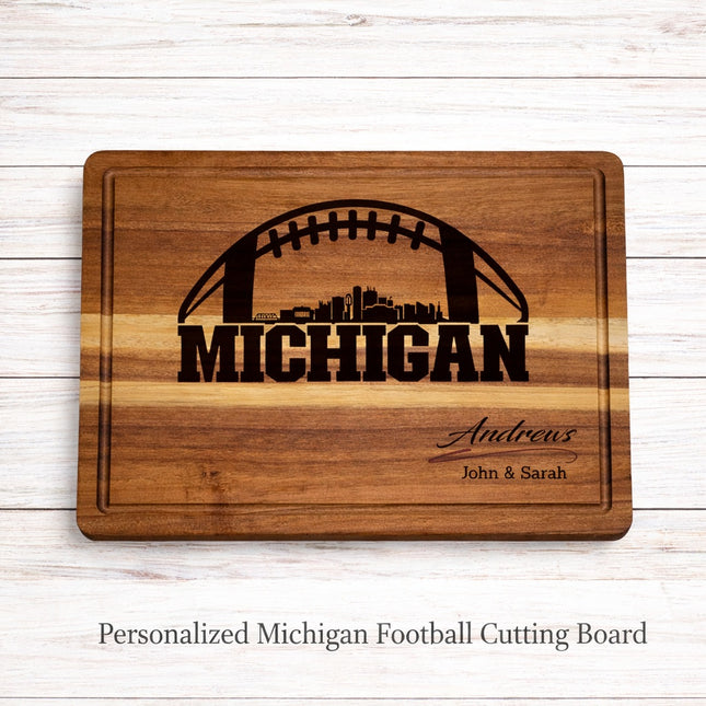 Personalized Michigan football cutting board on rustic wood background with laser engraved design