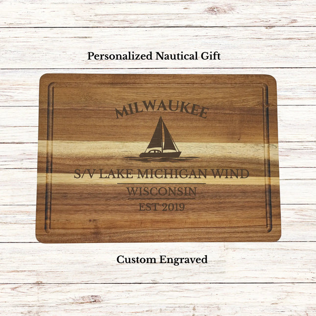 Personalized Milwaukee Wisconsin sailboat cutting board engraved with S V Lake Michigan Wind Schneider family name nautical kitchen gift
