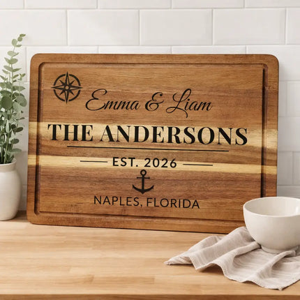 Personalized nautical cutting board displayed in a bright coastal kitchen with neutral decor