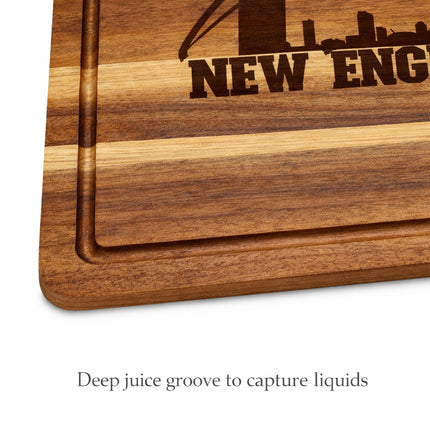 Close-up of deep juice groove on personalized New England football acacia wood cutting board, showing thick edge and engraved detail