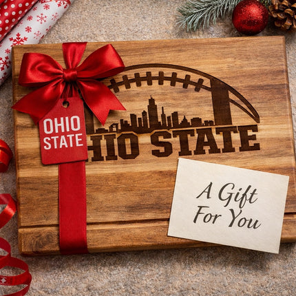 Ohio State football acacia wood cutting board shown as a gift idea with festive presentation and laser engraved design
