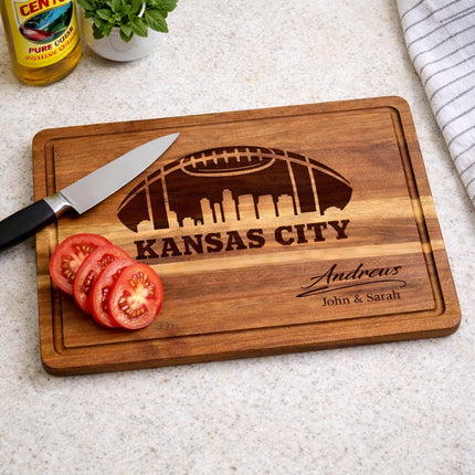 Personalized Kansas City football cutting board shown in a kitchen setting with fresh ingredients and chef knife