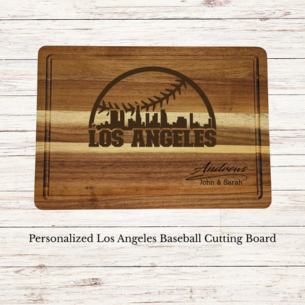 Personalized Los Angeles baseball cutting board engraved on acacia wood with custom family name and skyline design