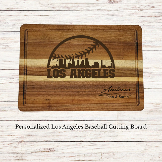 Personalized Los Angeles baseball cutting board engraved on acacia wood with custom family name and skyline design