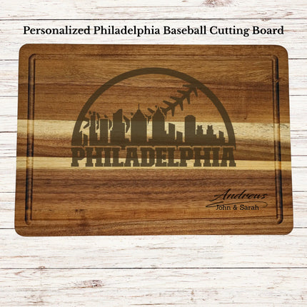 Personalized Philadelphia baseball cutting board engraved on acacia wood with custom family name and skyline design