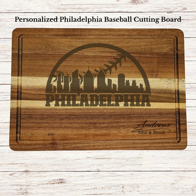 Personalized Philadelphia baseball cutting board engraved on acacia wood with custom family name and skyline design
