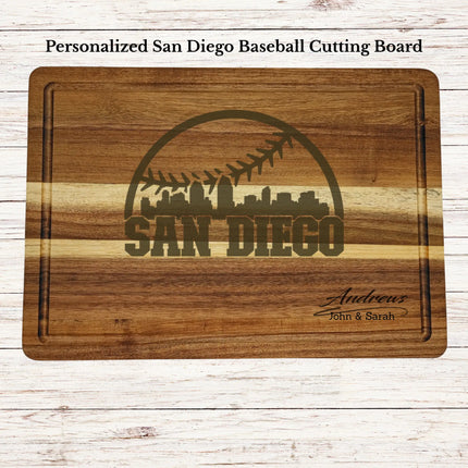 Personalized San Diego baseball cutting board engraved on acacia wood with custom family name and skyline design