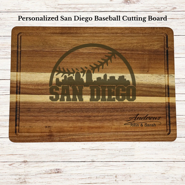 Personalized San Diego baseball cutting board engraved on acacia wood with custom family name and skyline design