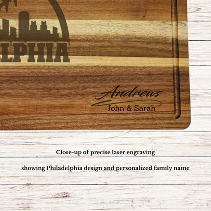 Close up of laser engraved Philadelphia skyline baseball design on personalized acacia wood cutting board