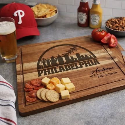 Philadelphia baseball cutting board displayed in kitchen or game day setting with snacks and drinks for entertaining