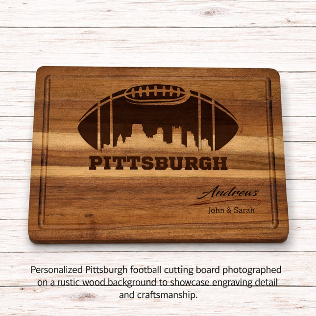 Personalized Pittsburgh football cutting board on rustic wood background