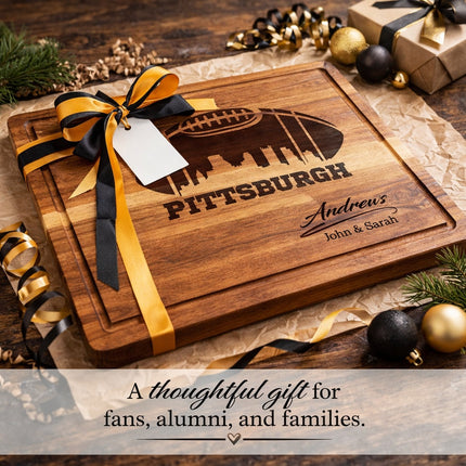 Personalized Pittsburgh football cutting board presented as a gift with black and gold ribbon