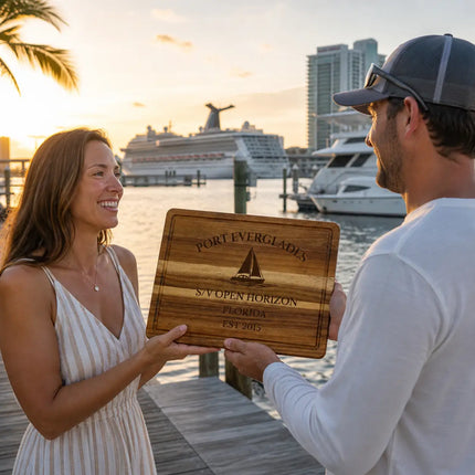 Port Everglades Florida personalized cutting board being given as a gift on a dock at sunset with yachts marina and coastal skyline
