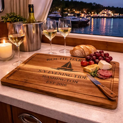 Roche Harbor Washington sailboat cutting board used on a boat at the dock during evening with wine and food overlooking the marina