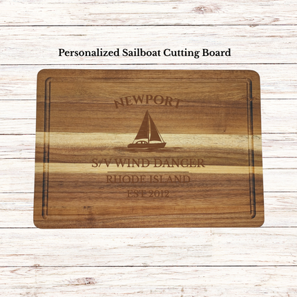 Personalized Newport Rhode Island sailboat cutting board engraved with boat name and harbor home port on acacia wood