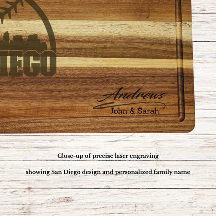 Close up of laser engraved San Diego skyline baseball design on personalized acacia wood cutting board