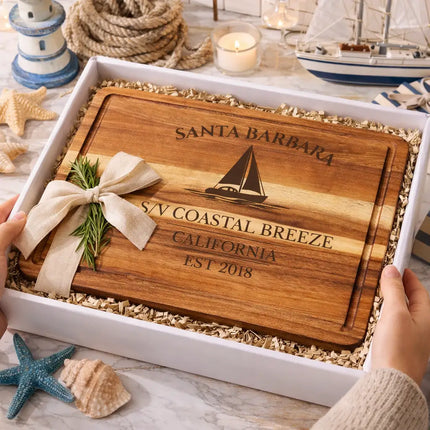 Santa Barbara California personalized cutting board gift in nautical themed box with rope shells and sailboat decor