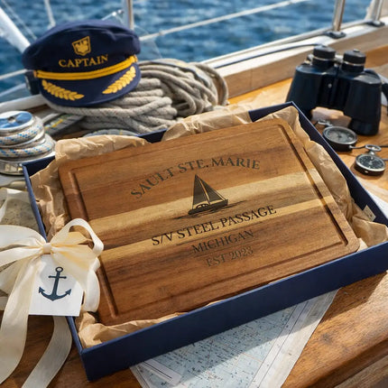 Personalized Sault Ste Marie Michigan cutting board presented in gift box with nautical theme perfect for sailors housewarming wedding or retirement gift