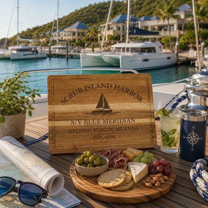 Scrub Island Harbor British Virgin Islands sailboat cutting board displayed beside turquoise Caribbean marina waters modern catamarans upscale tropical marina buildings and lush island scenery
