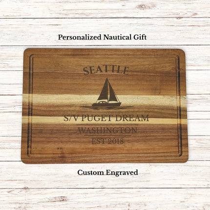 Personalized Seattle Washington sailboat cutting board engraved with Puget Dream boat name nautical gift