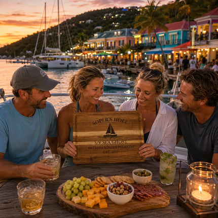 Soper’s Hole Harbor British Virgin Islands personalized cutting board being shared during a tropical Caribbean marina gathering beside colorful waterfront buildings and catamarans