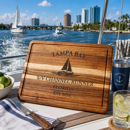 Tampa Bay Florida sailboat cutting board on a boat cockpit table with marina boats water and active coastal boating setting