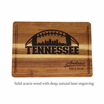 Tennessee football cutting board on white background showing solid acacia wood with deep natural laser engraving and personalized family name
