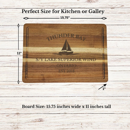 Thunder Bay Ontario sailboat cutting board shown in kitchen setting demonstrating size scale and proportions for serving and display