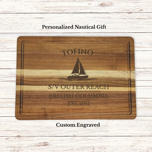 Tofino British Columbia sailboat cutting board personalized with Outer Reach boat name nautical gift