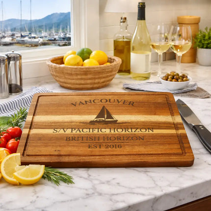 Vancouver British Columbia sailboat cutting board displayed in coastal kitchen with marina view fresh ingredients and nautical decor