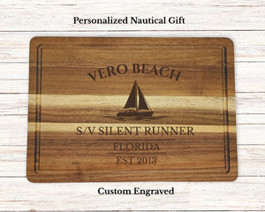 Vero Beach Florida sailboat cutting board personalized with Quiet Current boat name nautical gift