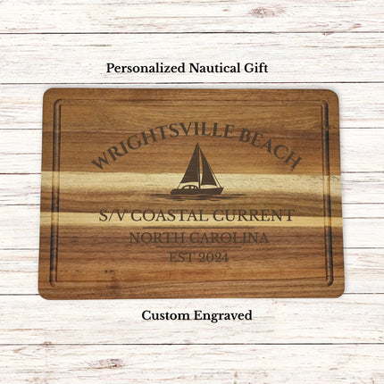Personalized Wrightsville Beach North Carolina sailboat cutting board engraved with boat name coastal current and established year