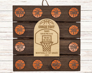 Personalized youth basketball coach award plaque with custom player names and jersey numbers engraved on wood